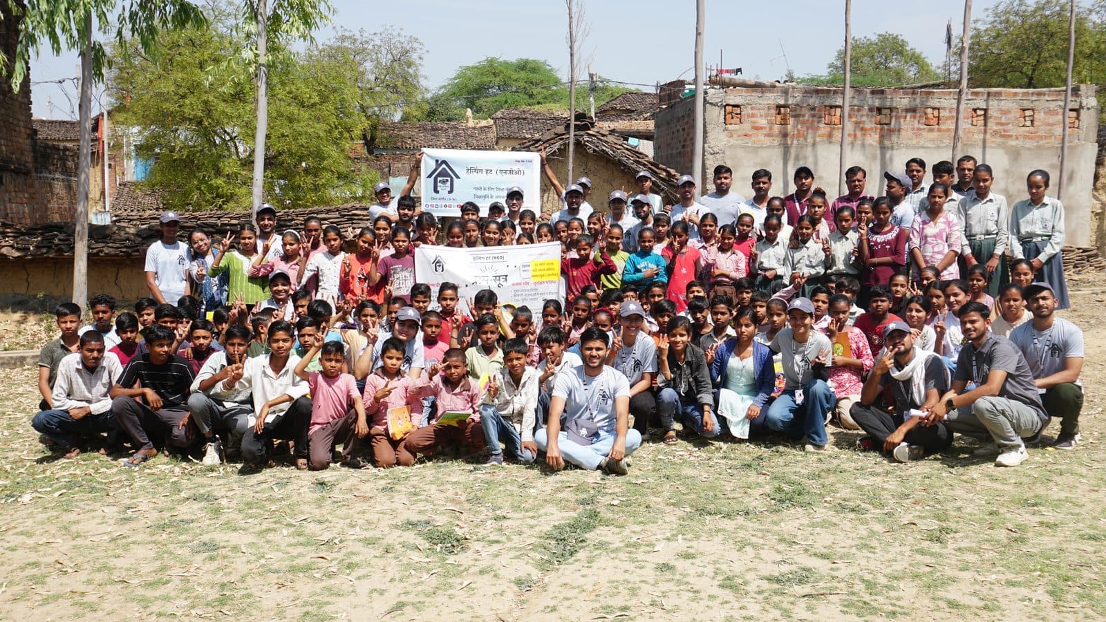 A large gathering of children and villagers at the GramSutr Gopalpura camp